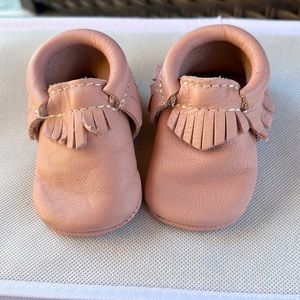 Freshly picked blush pink baby moccasin. Soft sole. Newborn- 6 months size